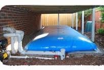 Picture of rainwater pillow under deck.