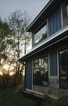 Picture of passive solar design from south elevation, the Springtime Cottage in West Asheville